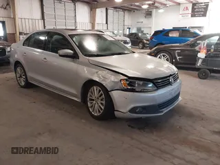 2012 Volkswagen Jetta Sedan SEL w/Sunroof with VIN 3VWLX7AJ4CM344390, listed as a IAAI auction lot 41439880 with 220,093 mi miles. Bid and sale history available at carsss.com. Image 1.