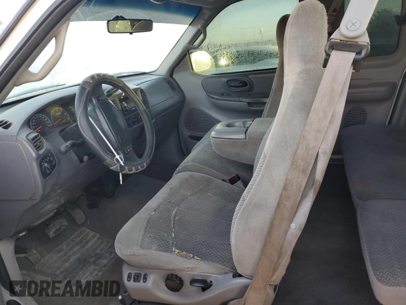 2000 Ford F-150 XL with VIN 1FTRX18L3YKA09007, listed as a Copart auction lot 42828005 with 218,563 mi miles and Salvage Title. Bid and sale history available at carsss.com. Image 7.