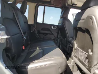 2024 Jeep Wrangler Sahara z VIN 1C4RJXP62RW228549, wystawiony jako Copart lot #57480235 z przebiegiem 6 036 mil mil oraz Szkoda całkowita • Salvage title. Historia ofert i sprzedaży dostępna na DreamBid. Obrazek 11.