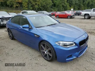 2014 BMW M5 z VIN WBSFV9C5XED097563, wystawiony jako Copart lot #72175354 z przebiegiem 73 406 mil mil oraz Szkody całkowita. Historia ofert i sprzedaży dostępna na DreamBid. Obrazek 4.