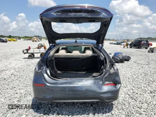 2023 Honda Civic EX-L z VIN 19XFL1H72PE010913, wystawiony jako Copart lot #51608005 z przebiegiem 35 961 mil mil oraz Szkoda całkowita • Salvage title. Historia ofert i sprzedaży dostępna na DreamBid. Obrazek 6.