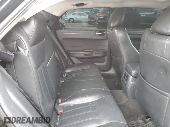 2009 Chrysler 300 z VIN 2C3KK63T39H629020, wystawiony jako Copart lot #65266734 z przebiegiem 175 591 mil mil oraz Szkoda całkowita • Salvage title. Historia ofert i sprzedaży dostępna na DreamBid. Obrazek 10.