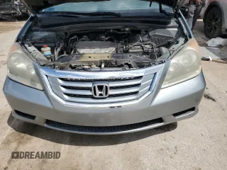 2010 Honda Odyssey EX-L с VIN 5FNRL3H79AB073307, выставлен на аукционе Copart как лот 55642225 с пробегом Не указан миль и Списание • Salvage title. История ставок и продаж доступна на DreamBid. Изображение 12.
