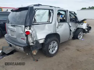 2011 GMC Yukon SLT z VIN 1GKS1CE00BR242127, wystawiony jako IAAI lot #42271949 z przebiegiem Nie podano mil oraz . Historia ofert i sprzedaży dostępna na DreamBid. Obrazek 4.