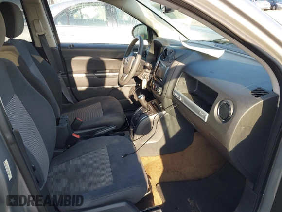 2016 Jeep Compass 75th Anniversary with VIN 1C4NJCBB1GD763361, listed as a IAAI auction lot 41976208 with 144,399 mi miles. Bid and sale history available at carsss.com. Image 5.
