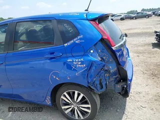 2016 Honda Fit EX-L with VIN JHMGK5H84GS008857, listed as a IAAI auction lot 42589888 with 100,701 mi miles and . Bid and sale history available at DreamBid. Image 18.