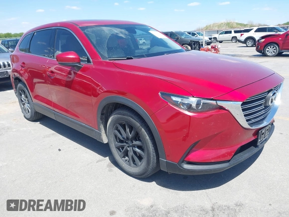 2016 Mazda CX-9 Touring with VIN JM3TCBCY5G0104504, listed as a IAAI auction lot 42314649 with 116,536 mi miles and . Bid and sale history available at DreamBid. Image 1.