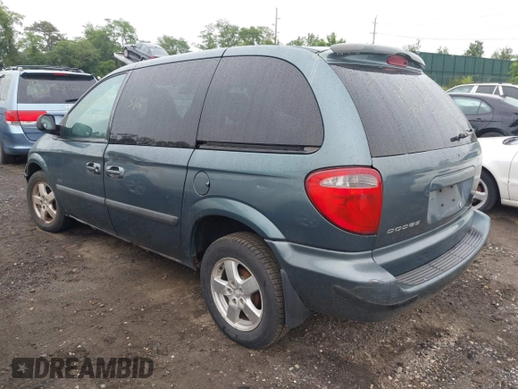 2005 Dodge Caravan SXT with VIN 1D4GP45R55B279825, listed as a IAAI auction lot 42532684 with 157,167 mi miles and . Bid and sale history available at DreamBid. Image 3.