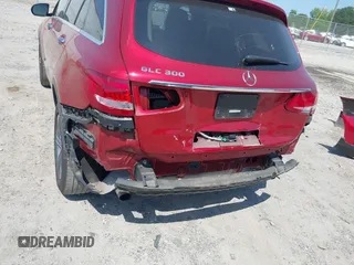 2019 Mercedes-Benz GLC 300 with VIN WDC0G4JB0KF657118, listed as a IAAI auction lot 42318010 with 77,578 mi miles and . Bid and sale history available at DreamBid. Image 6.
