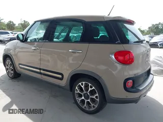 2014 FIAT 500L Trekking with VIN ZFBCFADH2EZ018037, listed as a IAAI auction lot 42196695 with 88,743 mi miles and . Bid and sale history available at DreamBid. Image 3.