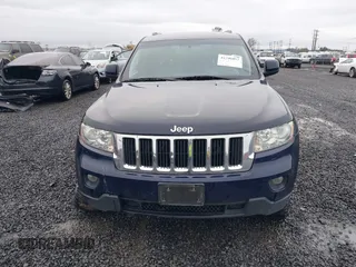 2012 Jeep Grand Cherokee Laredo with VIN 1C4RJFAG9CC220145, listed as a IAAI auction lot 41798457 with 130,603 mi miles. Bid and sale history available at carsss.com. Image 12.