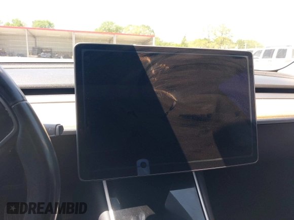 2018 Tesla Model 3 Long Range Battery with VIN 5YJ3E1EAXJF019907, listed as a IAAI auction lot 41995969 with Not Provided miles and . Bid and sale history available at DreamBid. Image 7.