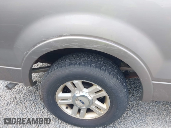 2004 Ford F-150 XL with VIN 1FTPX12584NA58780, listed as a IAAI auction lot 42123687 with 160,672 mi miles. Bid and sale history available at carsss.com. Image 13.