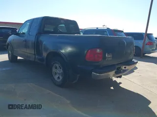 2001 Ford F-150 XL with VIN 2FTRX07W61CA71131, listed as a IAAI auction lot 41375828 with 216,340 mi miles. Bid and sale history available at carsss.com. Image 3.