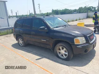 2005 GMC Envoy SLT z VIN 1GKDT13S652248183, wystawiony jako IAAI lot #42383999 z przebiegiem Nie podano mil oraz . Historia ofert i sprzedaży dostępna na DreamBid. Obrazek 1.