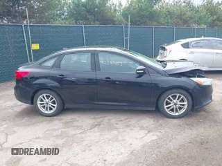2017 Ford Focus SE with VIN 1FADP3F25HL239809, listed as a IAAI auction lot 42163669 with 140,220 mi miles and . Bid and sale history available at DreamBid. Image 14.