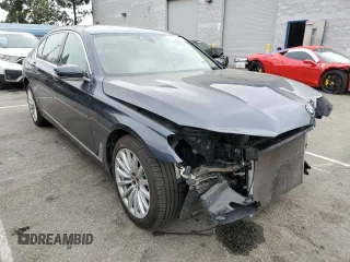2016 BMW 7 Series 740i with VIN WBA7E2C52GG504213, listed as a Copart auction lot 53120313 with 55,933 mi miles. Bid and sale history available at carsss.com. Image 4.