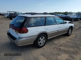 1999 Subaru Legacy Outback with VIN 4S3BG6850X7649578, listed as a Copart auction lot 56654155 with 174,651 mi miles and Salvage title. Bid and sale history available at DreamBid. Image 3.