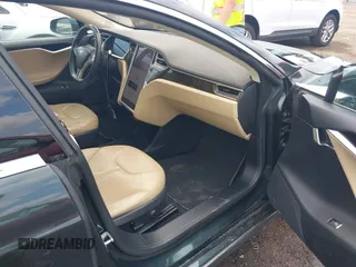 2013 Tesla Model S с VIN 5YJSA1DG9DFP06457, выставлен на аукционе IAAI как лот 42432903 с пробегом 108 007 миль миль и . История ставок и продаж доступна на DreamBid. Изображение 5.