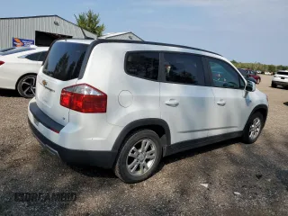2012 Chevrolet Orlando 1LT z VIN KL77P2EM6CK569152, wystawiony jako Copart lot #69464984 z przebiegiem 70 194 mil mil oraz Tytuł czysty. Historia ofert i sprzedaży dostępna na DreamBid. Obrazek 3.