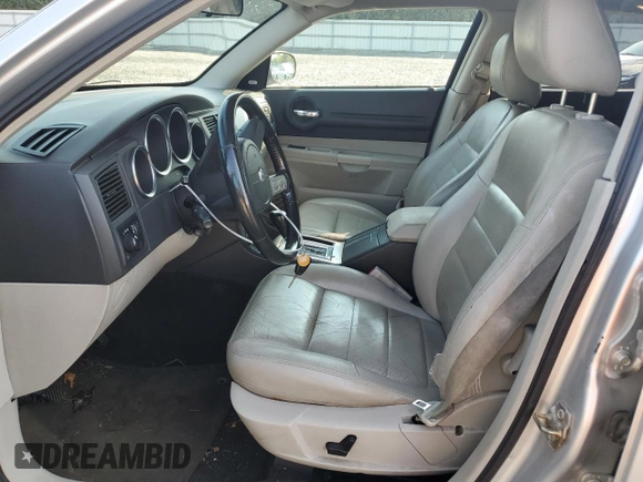 2005 Dodge Magnum RT z VIN 2D4GV58255H677120, wystawiony jako Copart lot #65955544 z przebiegiem 157 671 mil mil oraz Szkoda całkowita • Salvage title. Historia ofert i sprzedaży dostępna na DreamBid. Obrazek 7.