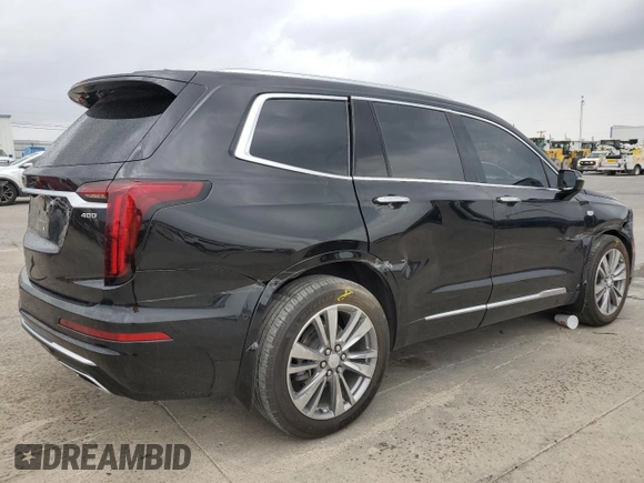 2021 Cadillac XT6 Premium Luxury z VIN 1GYKPERS0MZ181151, wystawiony jako Copart lot #78808104 z przebiegiem 31 697 mil mil oraz Szkoda całkowita • Salvage title. Historia ofert i sprzedaży dostępna na DreamBid. Obrazek 3.