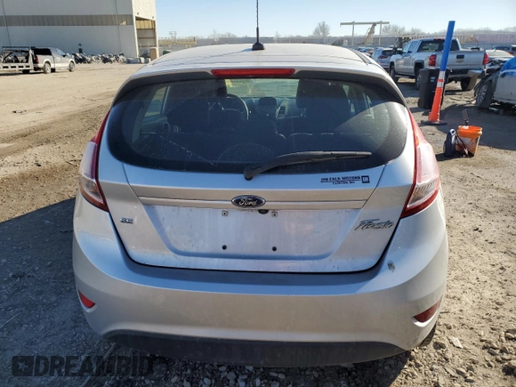 2019 Ford Fiesta SE z VIN 3FADP4EJ8KM109527, wystawiony jako Copart lot #42411655 z przebiegiem Nie podano mil oraz Szkoda całkowita • Salvage title. Historia ofert i sprzedaży dostępna na DreamBid. Obrazek 6.
