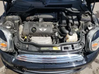 2012 MINI Hardtop with VIN WMWSU3C52CT369481, listed as a Copart auction lot 56030045 with 146,546 mi miles and Salvage title. Bid and sale history available at DreamBid. Image 11.