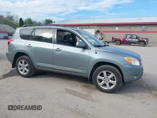 2008 Toyota RAV4 Limited with VIN JTMBD31VX86073331, listed as a IAAI auction lot 42270260 with 124,450 mi miles and . Bid and sale history available at DreamBid. Image 14.