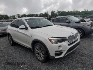 2015 BMW X4 xDrive28i z VIN 5UXXW3C53F0M87109, wystawiony jako Copart lot #54507325 z przebiegiem 115 989 mil mil oraz Tytuł czysty. Historia ofert i sprzedaży dostępna na DreamBid. Obrazek 4.