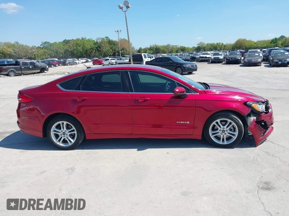 2018 Ford Fusion SE z VIN 3FA6P0LU9JR279976, wystawiony jako IAAI lot #41792558 z przebiegiem 115 790 mil mil oraz . Historia ofert i sprzedaży dostępna na DreamBid. Obrazek 13.