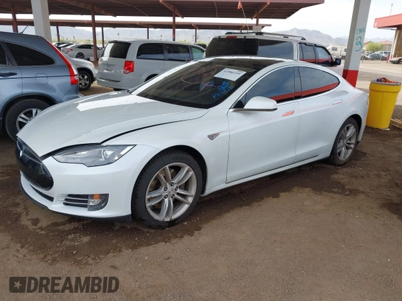2013 Tesla Model S с VIN 5YJSA1CG8DFP22036, выставлен на аукционе IAAI как лот 41886249 с пробегом 125 477 миль миль и . История ставок и продаж доступна на DreamBid. Изображение 2.