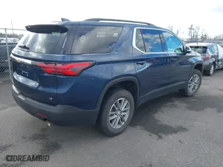 2023 Chevrolet Traverse LT Cloth with VIN 1GNEVGKW4PJ105766, listed as a IAAI auction lot 41015841 with 42,128 mi miles. Bid and sale history available at carsss.com. Image 4.