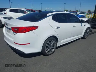 2014 Kia Optima SXL Turbo with VIN 5XXGR4A60EG270821, listed as a IAAI auction lot 41909669 with 242,119 mi miles and . Bid and sale history available at DreamBid. Image 4.