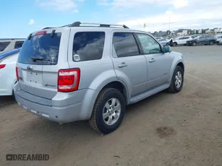 2009 Ford Escape Hybrid with VIN 1FMCU49319KA88009, listed as a IAAI auction lot 42065410 with 239,319 mi miles. Bid and sale history available at carsss.com. Image 4.