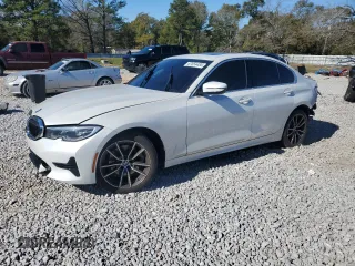 2021 BMW 3 Series 330i with VIN 3MW5R1J01M8B95759, listed as a Copart auction lot 87654485 with 73,864 mi miles and Salvage Title. Bid and sale history available at carsss.com. Image 1.