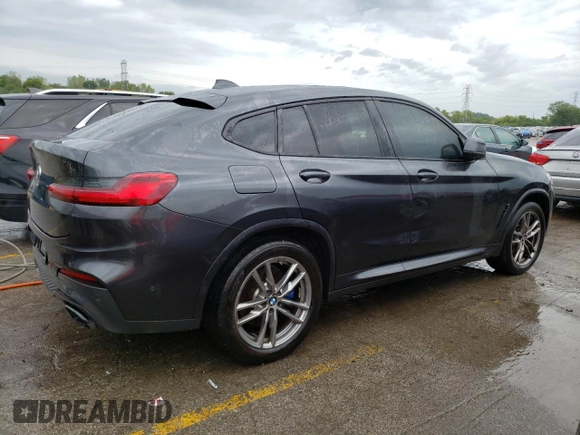 2021 BMW X4 M40i with VIN 5UX2V5C08M9E17162, listed as a Copart auction lot 67602073 with 33,879 mi miles. Bid and sale history available at carsss.com. Image 3.