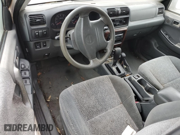 2002 Isuzu Rodeo S with VIN 4S2DM58W324327147, listed as a Copart auction lot 75194104 with Not Provided miles and Salvage Title. Bid and sale history available at DreamBid. Image 8.