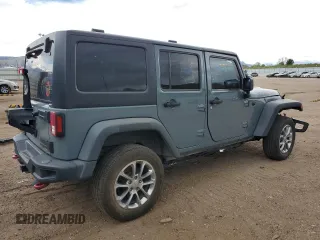 2014 Jeep Wrangler Unlimited Rubicon z VIN 1C4HJWFG0EL316513, wystawiony jako Copart lot #57182325 z przebiegiem 150 012 mil mil oraz Szkoda całkowita • Salvage title. Historia ofert i sprzedaży dostępna na DreamBid. Obrazek 3.