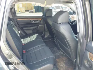 2018 Honda CR-V Touring with VIN 7FARW1H90JE030766, listed as a IAAI auction lot 41637900 with Not Provided miles and . Bid and sale history available at DreamBid. Image 8.