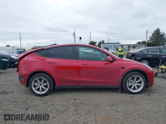 2023 Tesla Model Y Long Range with VIN 7SAYGDEE9PA145947, listed as a IAAI auction lot 42131783 with 4,956 mi miles and . Bid and sale history available at DreamBid. Image 14.