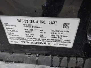 2021 Tesla Model S Plaid with VIN 5YJSA1E69MF439147, listed as a IAAI auction lot 41825656 with 25,626 mi miles. Bid and sale history available at carsss.com. Image 9.