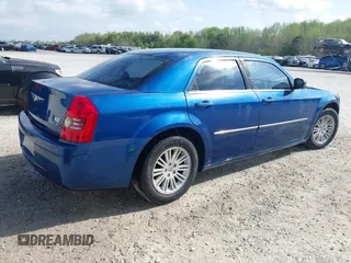 2009 Chrysler 300 LX with VIN 2C3KA43D69H614978, listed as a IAAI auction lot 41966879 with 247,871 mi miles. Bid and sale history available at carsss.com. Image 4.