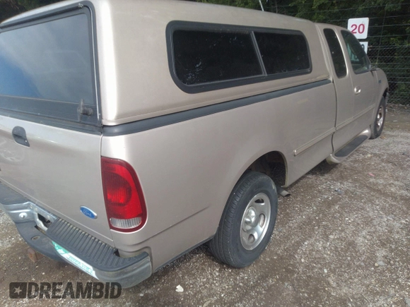 1997 Ford F-150 with VIN 1FTDX17W6VKB77743, listed as a IAAI auction lot 42633936 with 111,152 mi miles and . Bid and sale history available at DreamBid. Image 4.