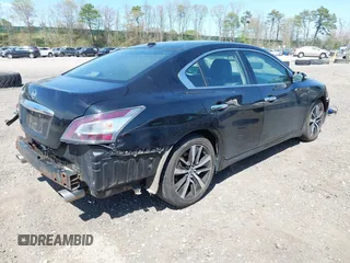 2014 Nissan Maxima S with VIN 1N4AA5AP0EC445232, listed as a IAAI auction lot 42154984 with 91,205 mi miles and . Bid and sale history available at DreamBid. Image 4.