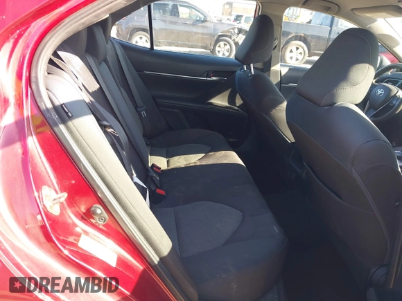 2019 Toyota Camry LE with VIN 4T1B11HK1KU233345, listed as a IAAI auction lot 41971136 with 51,499 mi miles and . Bid and sale history available at DreamBid. Image 8.