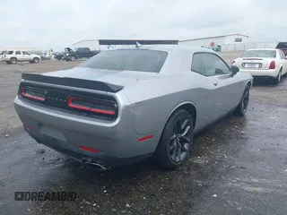 2016 Dodge Challenger SXT with VIN 2C3CDZAG2GH275767, listed as a IAAI auction lot 42095385 with 114,026 mi miles and . Bid and sale history available at DreamBid. Image 4.
