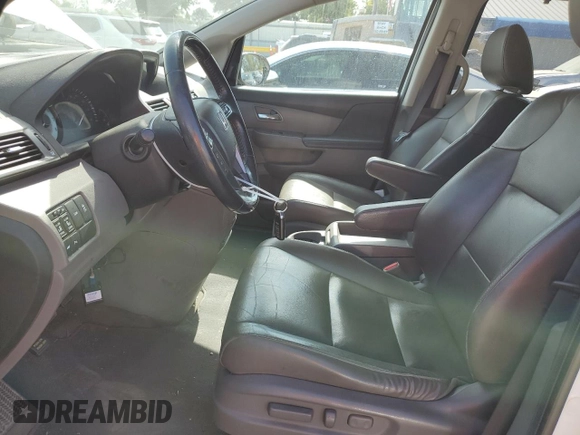 2014 Honda Odyssey Touring z VIN 5FNRL5H92EB059168, wystawiony jako Copart lot #76121914 z przebiegiem 264 715 mil mil oraz Szkoda całkowita • Salvage title. Historia ofert i sprzedaży dostępna na DreamBid. Obrazek 7.