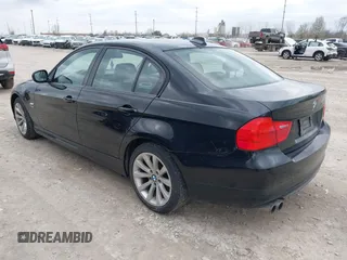2011 BMW 3 Series 328i xDrive with VIN WBAPK7C50BA816306, listed as a IAAI auction lot 41950040 with 243,166 mi miles. Bid and sale history available at carsss.com. Image 3.