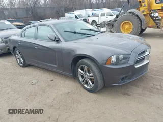 2014 Dodge Charger SXT Plus with VIN 2C3CDXJG0EH230635, listed as a IAAI auction lot 41890555 with 203,869 mi miles. Bid and sale history available at carsss.com. Image 1.